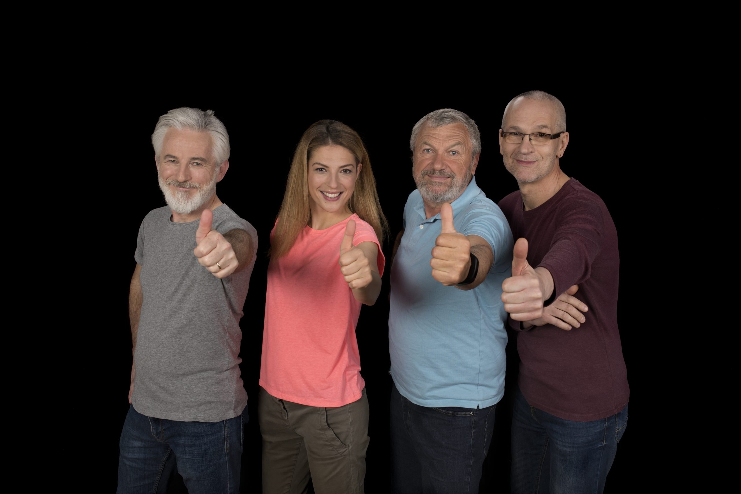 Portrait of men and woman standing together